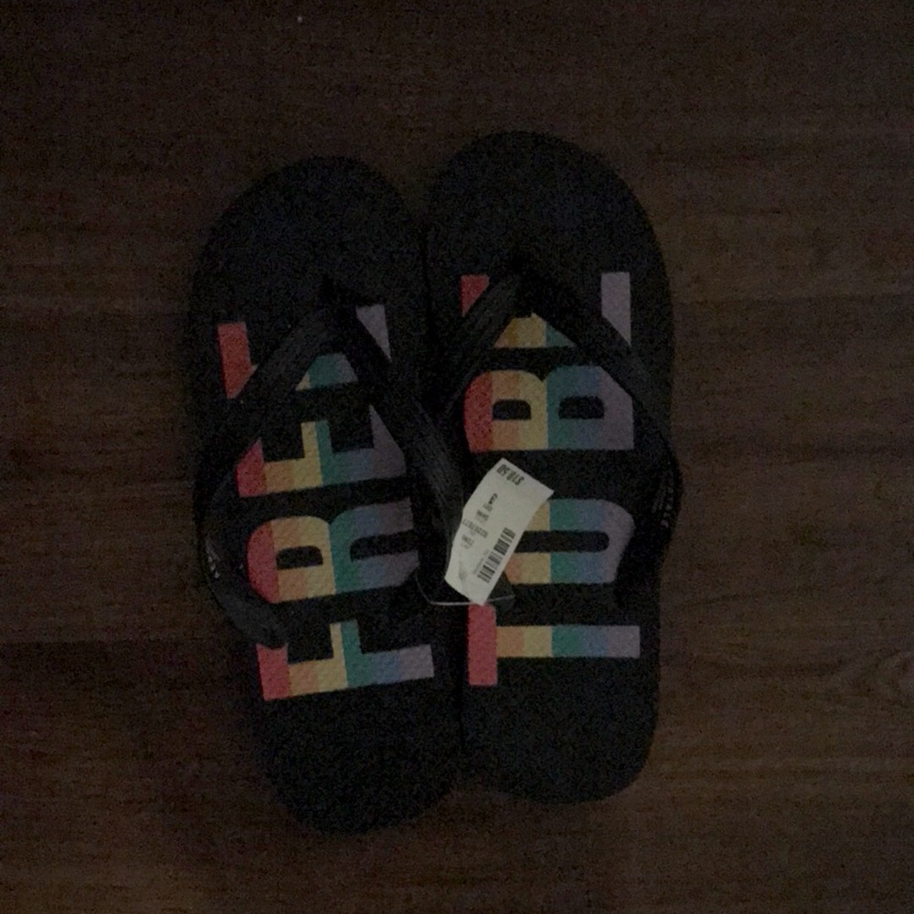 Black and colorful flip flops.